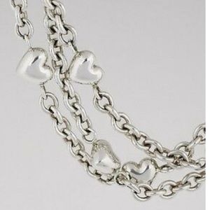 Tiffany & Co. 3 strand silver puff heart necklace.